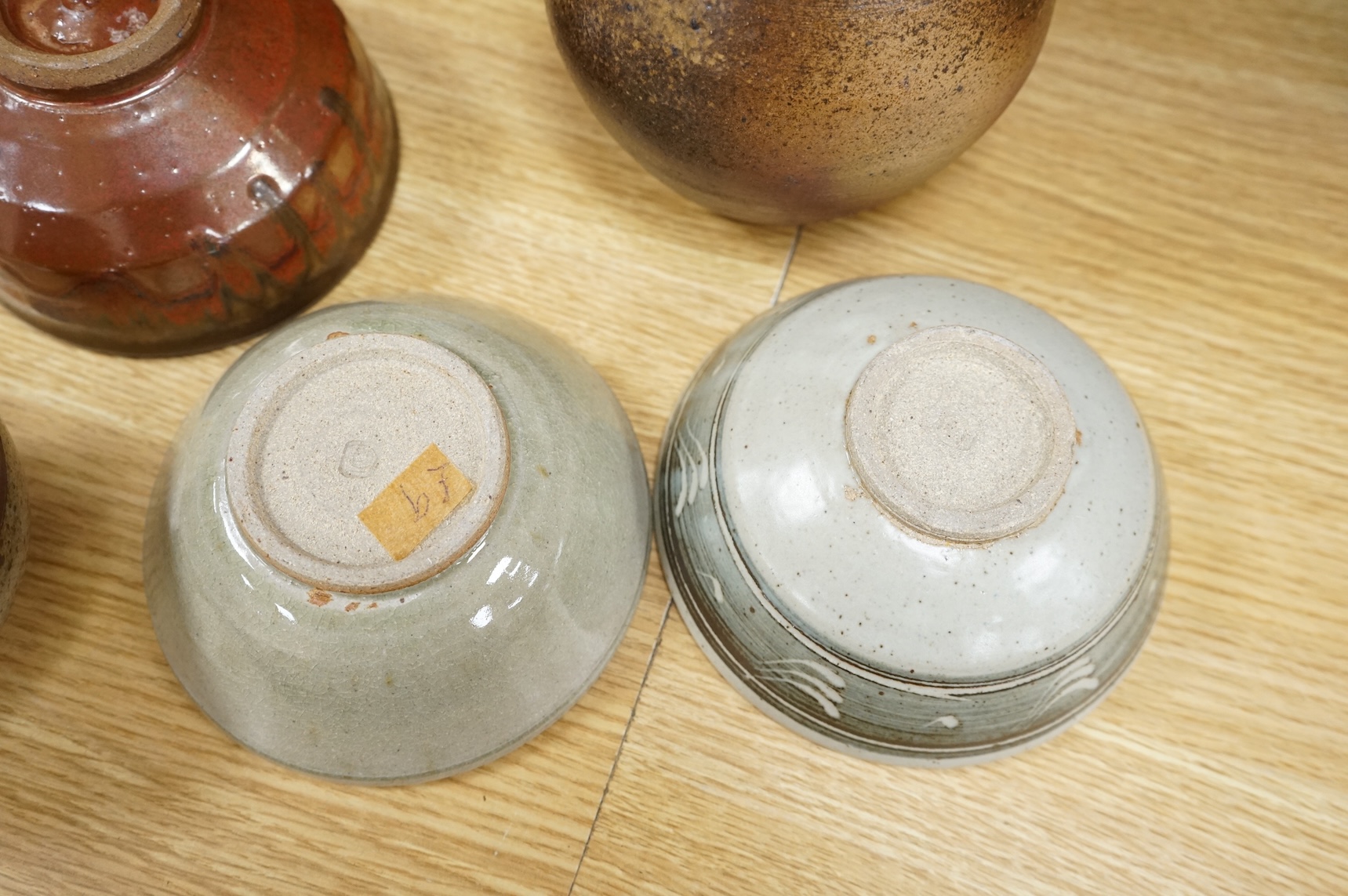 Six pieces of Studio pottery and a vase, largest 32cm high